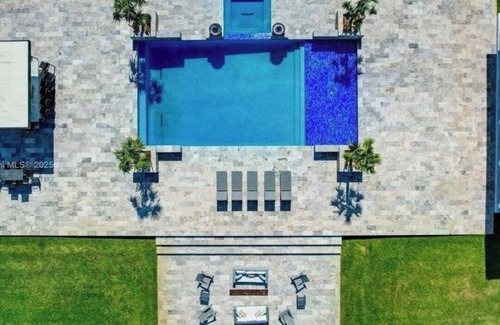Southwest Ranches Maison | Private, gated 8-bedroom oasis with 6 car garage in prestigous Southwest Ranches