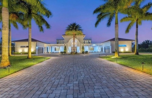 Southwest Ranches Maison | Private, gated 8-bedroom oasis with 6 car garage in prestigous Southwest Ranches