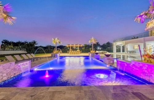 Southwest Ranches Maison | Private, gated 8-bedroom oasis with 6 car garage in prestigous Southwest Ranches