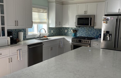 Silver Beach Maison | Private heated pool and spacious yard. 5 minute walk to the beach.