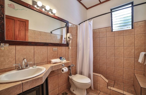 Heredia Hôtel | Private hotel room 10 minutes from the airport