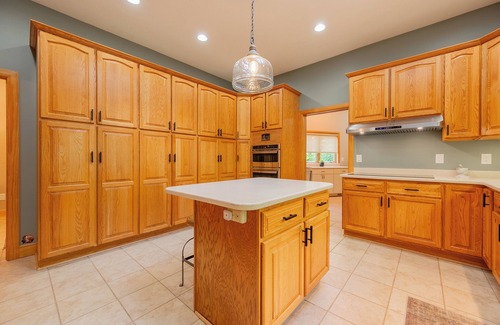 Dublin Maison | Private lakefront home with dock, forest views, balconies, game room, and cozy indoor charm