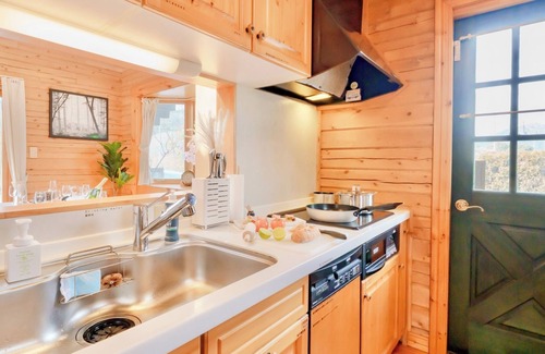 Sano Cottage | Private log house in Sano City with wood stove hammock board games and projector screen / Sano Tochigi
