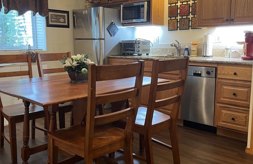 Briargate Maison | Private, Spacious Basement Suite with Kitchenette, A/C, Hot Tub, Family-friendly