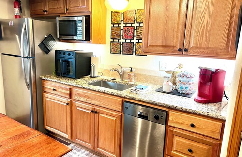 Briargate Maison | Private, Spacious Basement Suite with Kitchenette, A/C, Hot Tub, Family-friendly