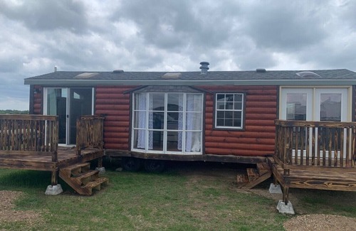 Platte Location De VR | Private Tiny Home with deck, fire pit & patio near Platte Creek Recreation area