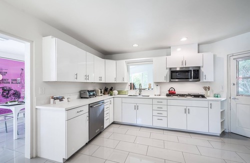 Tahquitz River Estates Maison | Mid-Century emblématique: 4BD / 3BA sans vent, piscine, spa, vues et chiens bienvenus!