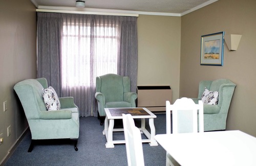 Evander Hôtel | Q's Evander Hotel and Apartment