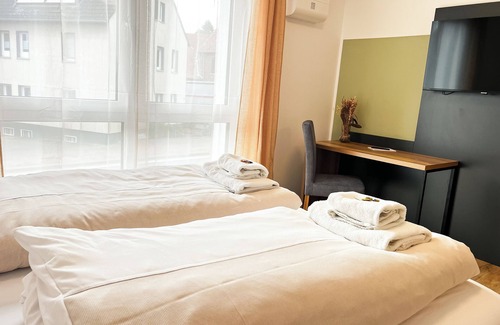 Detmold Hôtel | Qonroom - Detmold - shared kitchen - BBQ - App2