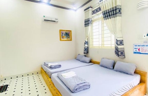 Dinh Quan Lit Et Petit-Déjeuner | Quốc Hưng Motel