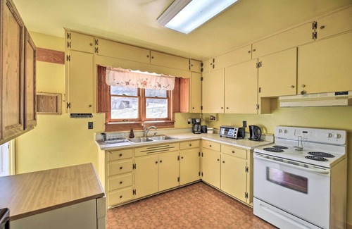 Atkins Maison | Quaint Creekside Home w/ Spacious Deck & Yard