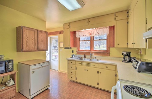 Atkins Maison | Quaint Creekside Home w/ Spacious Deck & Yard