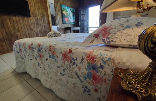 Praia Grande Appartement | Quarto Ipê Rosa