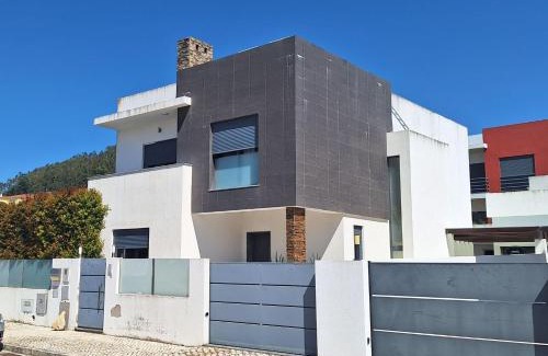 Sapataria Maison | Quartos com casa de banho privada perto da Malveira