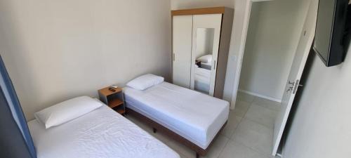 Ribeirao da Ilha Appartement | Quartos Confortáveis em casa compartilhada - 5 min Aeroporto Internacional