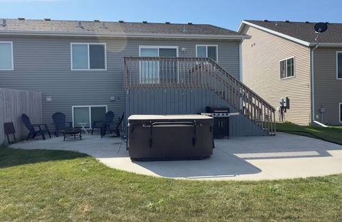Moorhead Maison | Quiet Comfort · Spacious Home with Hot Tub & Cozy Vibes