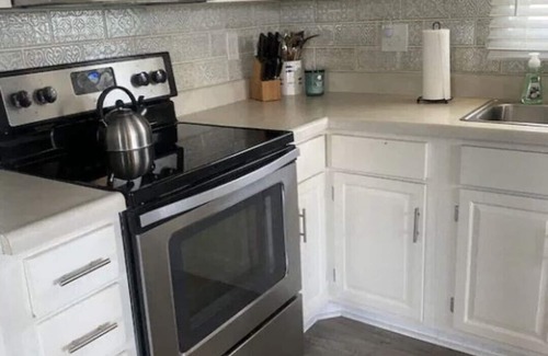 Prime Hook Beach Maison | Quiet dog friendly home overlooking nature preserve, 1 block from private beach.
