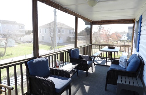 Prime Hook Beach Maison | Quiet dog friendly home overlooking nature preserve, 1 block from private beach.