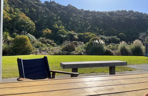 Kawhia Maison | Quiet private bush out look but right in town. Perfect for boaties