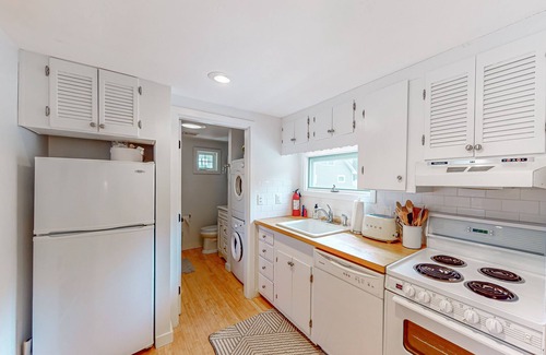Meredith Cottage | Quintessential lakeside cottage with swimming, picnic tables, & mountain view
