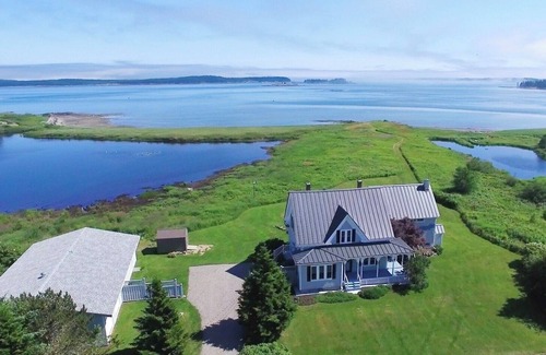 Jonesport Maison | Quintessential waterfront home with over 400 feet of private sandy beach.