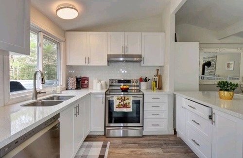 Highlands East Cottage | Quite luxury in a Tranquil cottage on a forested property with a waterfall.
