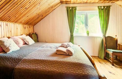 gmina Stary Dzierzgon Maison | Różany Ogród - dom pod lasem, z widokiem na jezioro i kominkiem, rowery, łódka, rowerek wodny