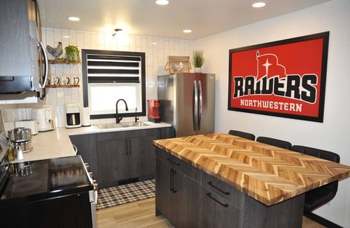 Orange City Maison | Raider Roost-Putting Green/Fire Pit/Game Room Close to NWC & Downtown!