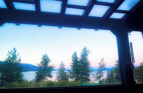 Woods Bay Maison | RARE FIND: Over 200' of Flathead Lake Lakefront with distinctive home