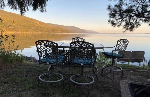 Woods Bay Maison | RARE FIND: Over 200' of Flathead Lake Lakefront with distinctive home