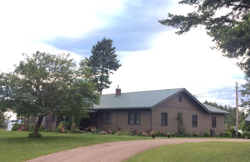 Woods Bay Maison | RARE FIND: Over 200' of Flathead Lake Lakefront with distinctive home