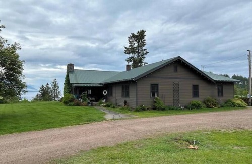 Woods Bay Maison | RARE FIND: Over 200' of Flathead Lake Lakefront with distinctive home