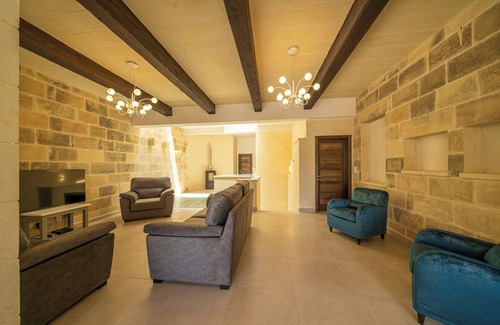 Munxar Villa | Recently built in vernacular style, Ta’ Spiru is spread over three floors