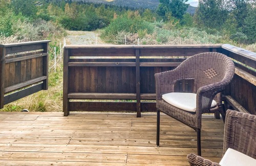 Nordre Land Maison | Recharge your batteries in this cozy log cabin near the Synna River.
