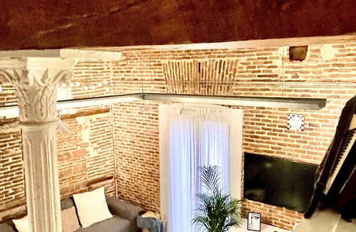 Atocha Appartement | Red brick loft sleeps 6-8 Lavapies Heart