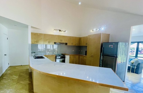 Rarotonga Maison | Red Hibiscus Luxury Home