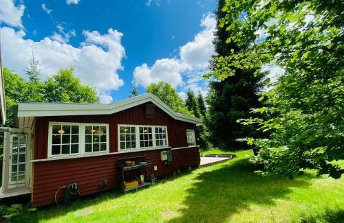 Ramlose Maison | Red Wood House Within Frederiksværk's Nature