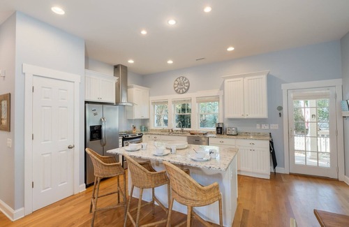 Cape Fear Station Maison | Reel Life tucked into a pretty, wooded bend in prestigious Cape Fear Station!