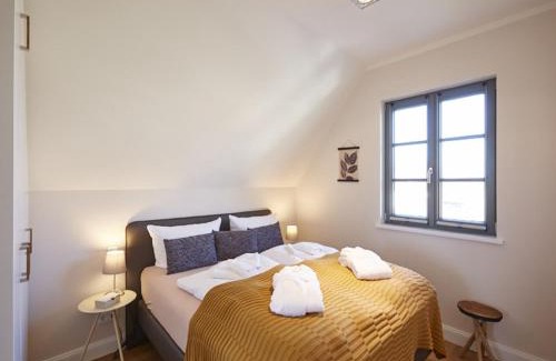 Kreptitz Maison | Reetland am Meer - Premium Reetdachvilla mit 3 Schlafzimmern, Sauna und Kamin E16