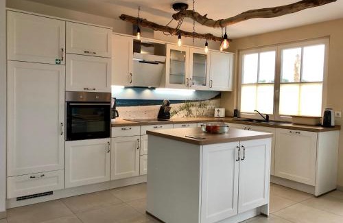 Parow Maison | Reetvilla Strelablick
