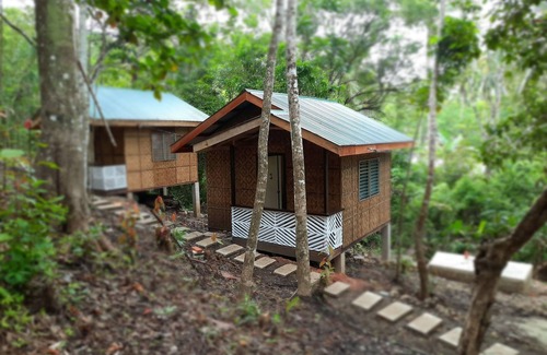 Batuan Cottage | détendez-vous et rechargez-vous après une longue journée d'aventure!