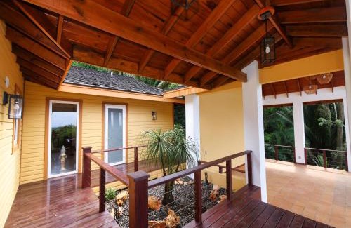 Gibson Bight Maison | Relax At This Hillside Retreat That Overlooks The Lush Forest And The Caribbean,