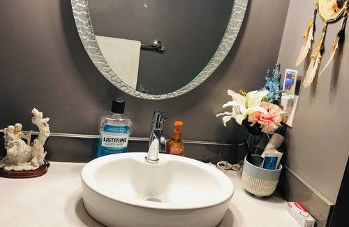Saint Thomas Maison | Relax in our cozy room with a private bath, designed for comfort and privacy.