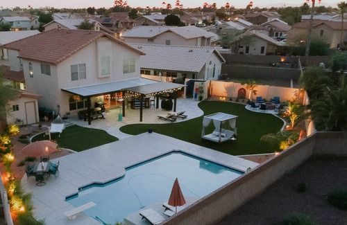 Avondale Maison | Relax in private heated hot tub or just bask in the sun by the pool.