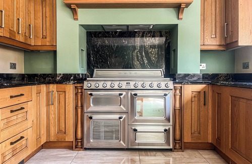 Margam Cottage | Relax in the hot tub and unwind in the peaceful, private garden.