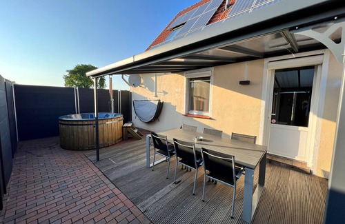 Neuborger Maison | Relax in the pool, whirlpool, sauna or wood-fired hot tub.