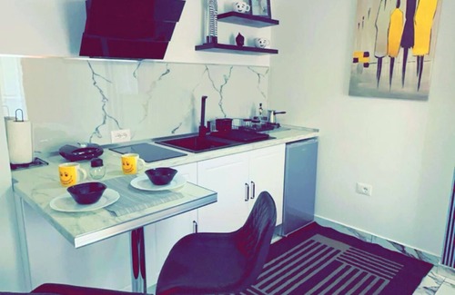 Shengjin Appartement | relax in this calm, stylish space. surrounded by a variety of businesses around