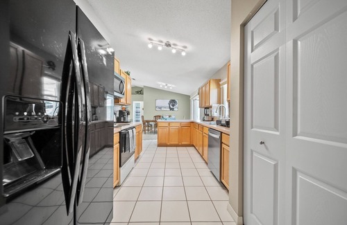 Indian Trails Maison | Relax in this pool home close to multiple beaches and tourist attractions!