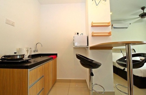 Downtown George Town Appartement | Détendez-vous sur un lit céleste après une longue journée