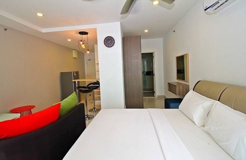 Downtown George Town Appartement | Détendez-vous sur un lit céleste après une longue journée